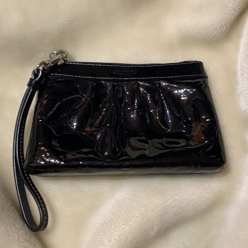 Shiny black small Coach wristlet/clutch